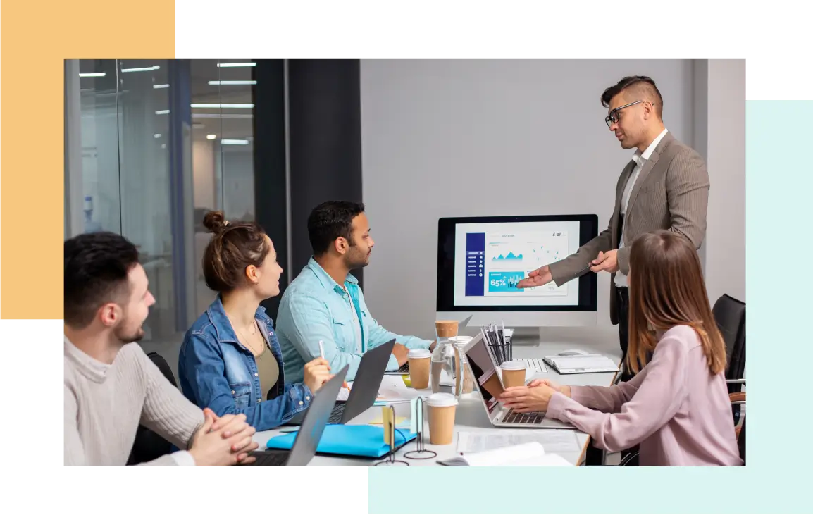 A team reviewing workforce information during a meeting